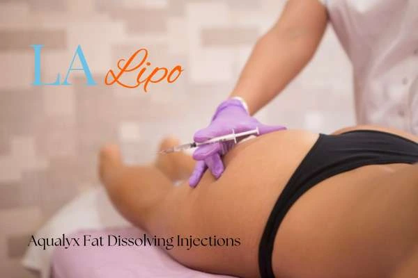Woman having fat dissolving injections Uttoxeter on thighs